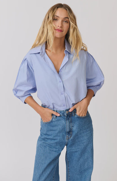 Button down front and classic collar with a 3/4 sleeve and elasticated cuff allowing volume and lift. Made from 100% cotton poplin it is breathable and easy care.