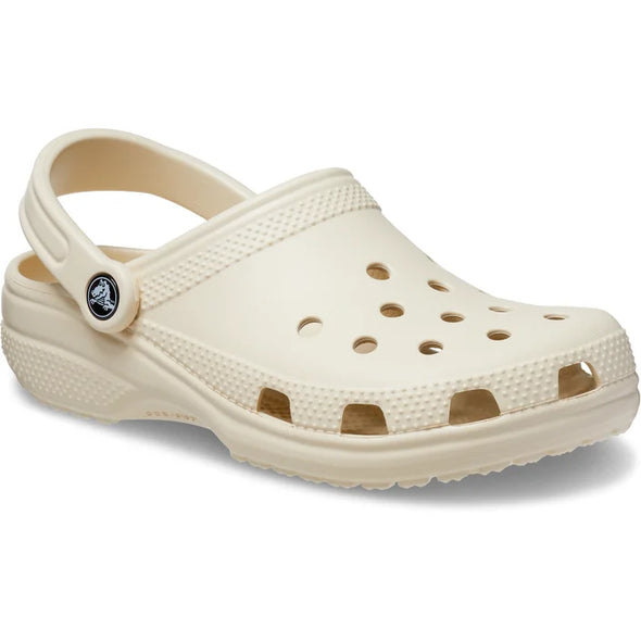 Original. Versatile. Comfortable. It’s the iconic clog that started a comfort revolution around the world! The go-to comfort shoe that you're sure to fall deeper in love with day after day. Crocs Classic Clogs offer lightweight Iconic Crocs Comfort™, a color for every personality, and an ongoing invitation to be comfortable in your own shoes. The Classic clog in Bone Colour