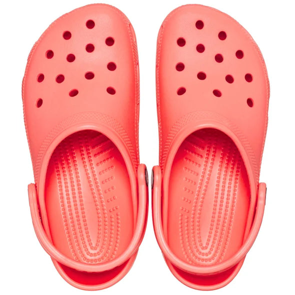 Original. Versatile. Comfortable. It’s the iconic clog that started a comfort revolution around the world! The go-to comfort shoe that you're sure to fall deeper in love with day after day. Crocs Classic Clogs offer lightweight Iconic Crocs Comfort™, a color for every personality, and an ongoing invitation to be comfortable in your own shoes. The Classic clog in neon watermelon Colour