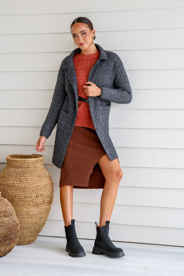 The Coatigan you have all been waiting for.&nbsp; Wool blend long line coatigan with pockets! we love a pocket. With a well designed collar to add extra elegance to this beautiful garment. Comes in both Latte and Charcoal and its going to be so hard to choose, you probably need both.