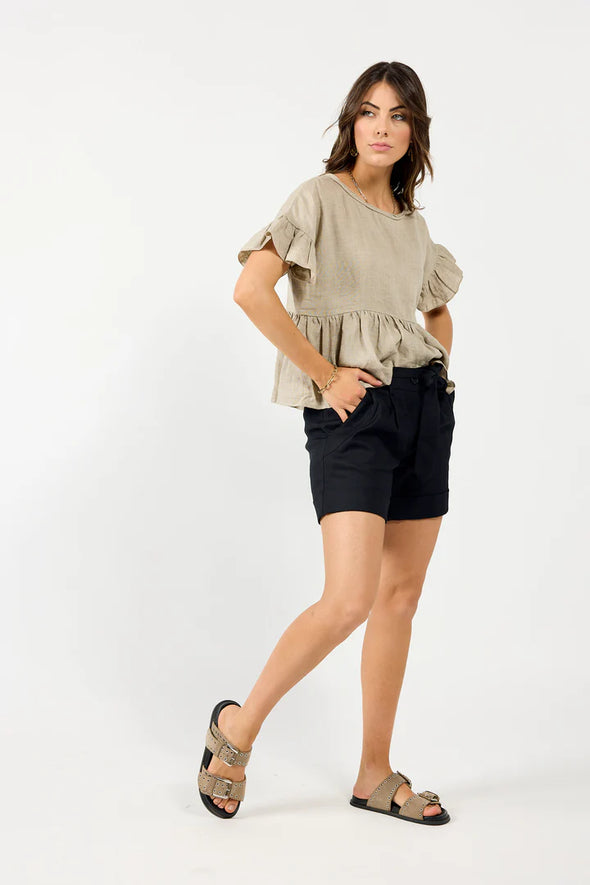 Introducing the Drama Selfless Short - a versatile and effortlessly stylish addition to your wardrobe. Crafted from high-quality linen, these shorts feature a unique curved pocket detail and a convenient self-tie belt. Designed with your comfort in mind, these shorts are easy to wear and perfect for any occasion.