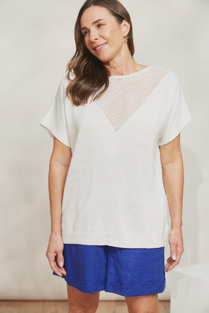 Crafted with a soft knit weave, the La Sable Knit Top is a lightweight beauty perfect for those relaxed days and transitional weather styling. This piece adds a fun twist to your outfit with its V-shaped open lace stitch detail on the front, giving your look texture. With short sleeves and a relaxed fit, it's all about comfort, whether you're lounging around or out for lunch. Just add your favourite denim and sneakers to complete the look.