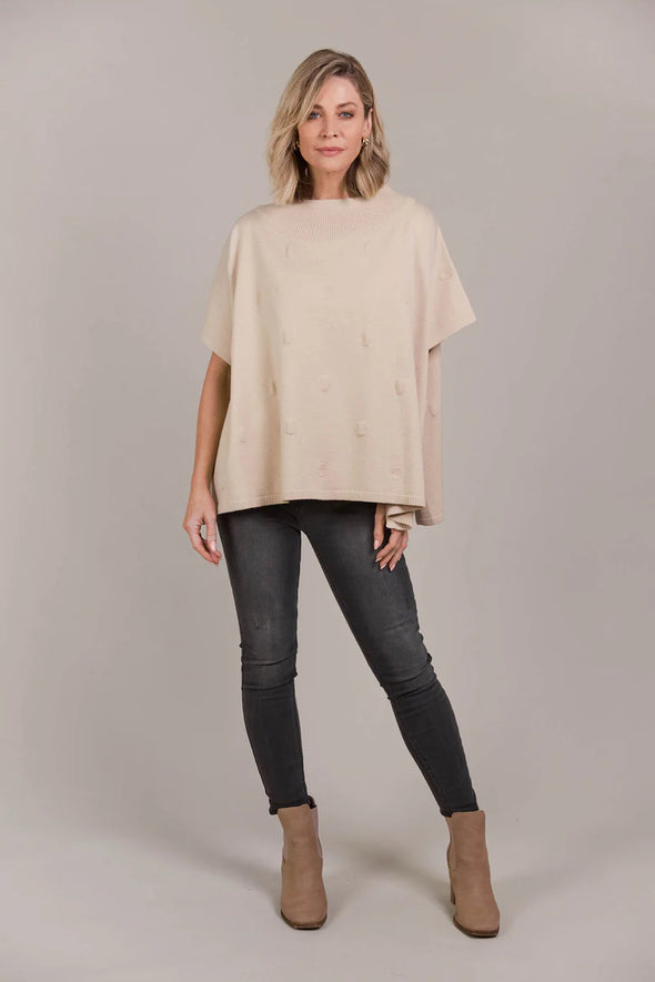 Mock turtle neck
Elbow-length sleeves with button detail
High side vents
Raise dot weave
Relaxed fit
30% Spandex, 28% Acrylic, 23% Polyamide, 19% Viscose
One Size