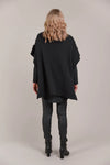 Rolled turtle neck
Elbow length sleeves
Side vents
High-low hem
Relaxed fit
42% Acrylic, 30% Polyester, 28% Nylon
One Size