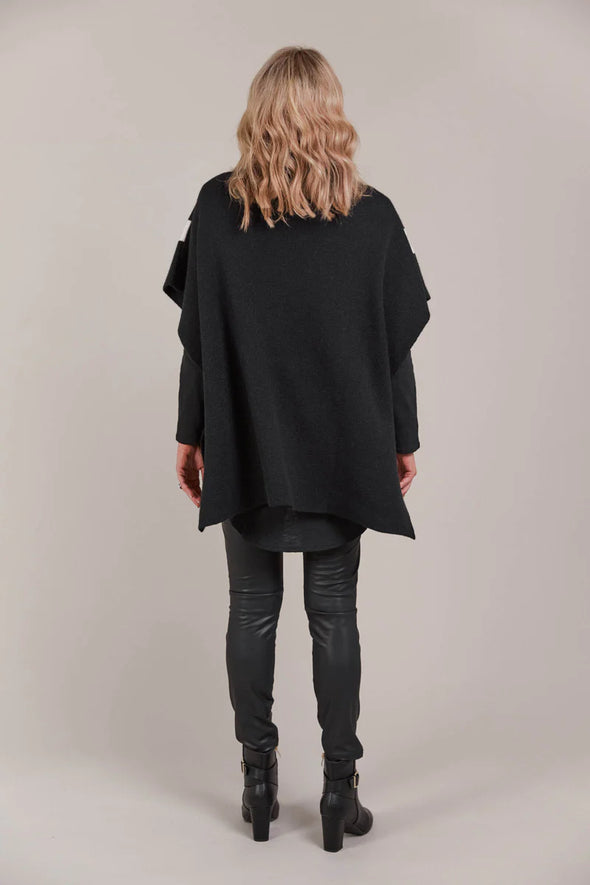 Rolled turtle neck
Elbow length sleeves
Side vents
High-low hem
Relaxed fit
42% Acrylic, 30% Polyester, 28% Nylon
One Size