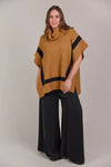 Rolled turtle neck
Elbow length sleeves
Side vents
High-low hem
Relaxed fit
42% Acrylic, 30% Polyester, 28% Nylon
One Size