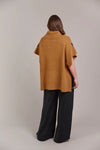 Rolled turtle neck
Elbow length sleeves
Side vents
High-low hem
Relaxed fit
42% Acrylic, 30% Polyester, 28% Nylon
One Size