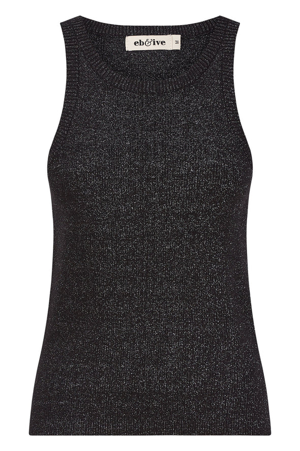 Take your casual wardrobe to the next level with the Lujo Tank. It features a round neck and sleeveless design in a fitted rib-knit that's both comfy and stylish. But here's the best part: it's threaded with shimmering lurex that catches the light and adds a touch of sparkle to your look! Wear it as it is with shorts and slides during warmer days, or layer it with an open button-down shirt and loose pants for an effortless transeasonal look.