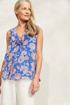 With a charming ruffle collar, V-neck, and playful drawstring, the Sereno Tank is perfect for any occasion. Shimmering lurex threading adds a lovely sparkle that will turn heads whether you're going out for dinner or hanging out with friends. Paired with linen pants or a breezy maxi skirt, don't forget to add some metallic accents for extra flair!