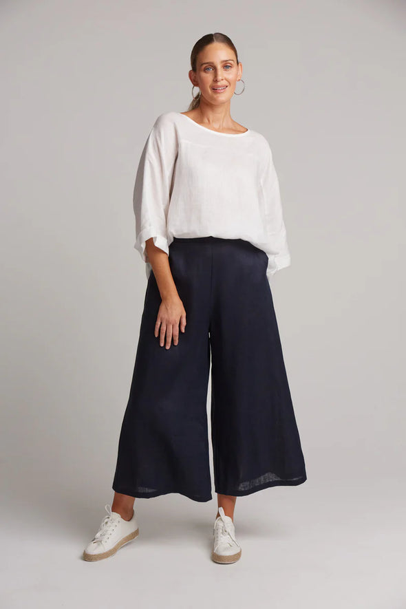 Get set for summer with the linen Studio Crop Pant. These wide flared pants are flowy, loose, and breezy, simply what all pant-wearing lovers crave for. Feeling comfortable is our top priority, without compromising on style. Wear these pants with a linen top for a sleek natural look.