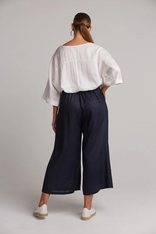 Get set for summer with the linen Studio Crop Pant. These wide flared pants are flowy, loose, and breezy, simply what all pant-wearing lovers crave for. Feeling comfortable is our top priority, without compromising on style. Wear these pants with a linen top for a sleek natural look.