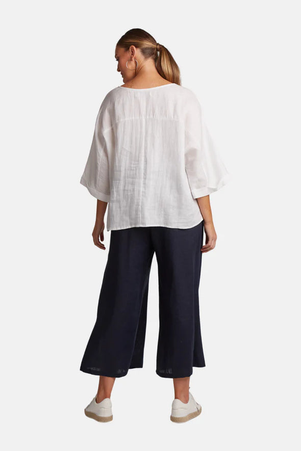 Minimal with panel details, we know how relaxed and cool you'll feel in the linen Studio Relaxed Top. The wide 3/4 sleeves create a subtle elegance.