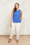 The Verano Tank is all about comfort and versatility, crafted with soft and stretchy cotton. Its sleeveless design and relaxed silhouette make it ideal for standalone wear or layering to elevate an outfit. With its adaptable style, the Verano Tank pairs effortlessly with jeans for a casual vibe or tucked into a maxi skirt or wide-leg trousers for a more polished look.