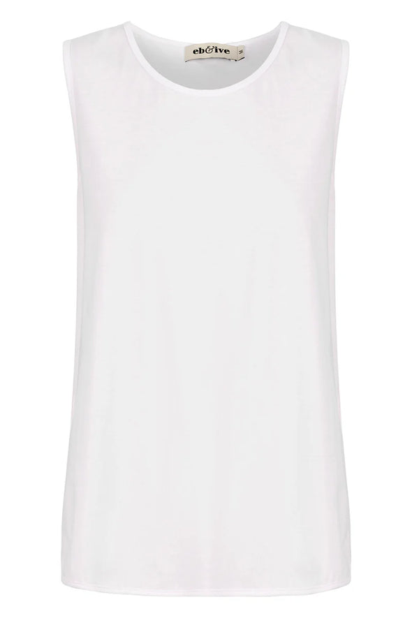 The Verano Tank is all about comfort and versatility, crafted with soft and stretchy cotton. Its sleeveless design and relaxed silhouette make it ideal for standalone wear or layering to elevate an outfit. With its adaptable style, the Verano Tank pairs effortlessly with jeans for a casual vibe or tucked into a maxi skirt or wide-leg trousers for a more polished look.