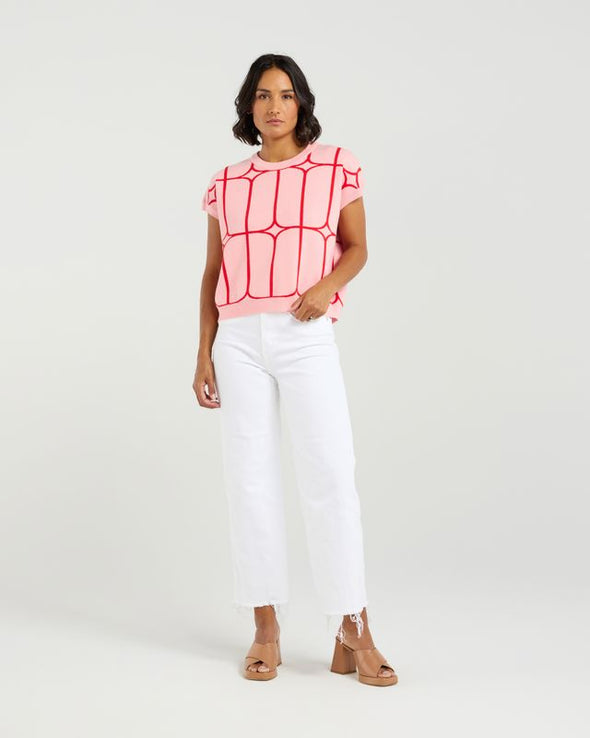 Stay cool and stylish in this summer-ready knit vest that’s full of playful charm. Made from soft knit fabric, it features a bold contrast trellis pattern that adds eye-catching texture. Whether layered over a crisp shirt or worn solo with tailored shorts, this vest brings a fun mix of structure and softness for a polished yet relaxed vibe.