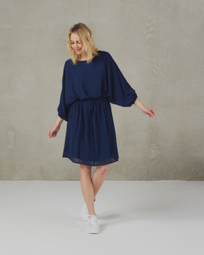 Your new go-to easy styling dress which is fully lined and features a scoop neckline, batwing style sleeves finished with elasticated hems, and adjustable drawstring waist ties  COLOUR Ink  FABRIC INFO Chiffon&nbsp; Main Fabric:&nbsp;100% Polyester&nbsp; Lining: 100% Polyester