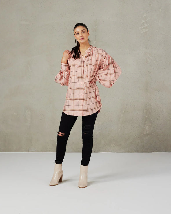 Taking the shirt trend to the next level this stunning shirt featuring mandarin collar, dropped shoulder and full sleeve with twisted knot feature is the epitome of cool  COLOUR Pink Windowpane Plaid  FABRIC INFO Woven Main Fabric:&nbsp;51% Cupro 39% Viscose 10% Polyester