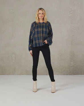 There is something so appealing about this soft tartan plaid fabric in this gorgeous round neck top with full raglan sleeves; the neckline has a self-fabric band with button  COLOUR Ink Tartan  FABRIC INFO Drapey woven Main Fabric:&nbsp;65% Polyester&nbsp; 35% Rayon Lining: 100% Polyester
