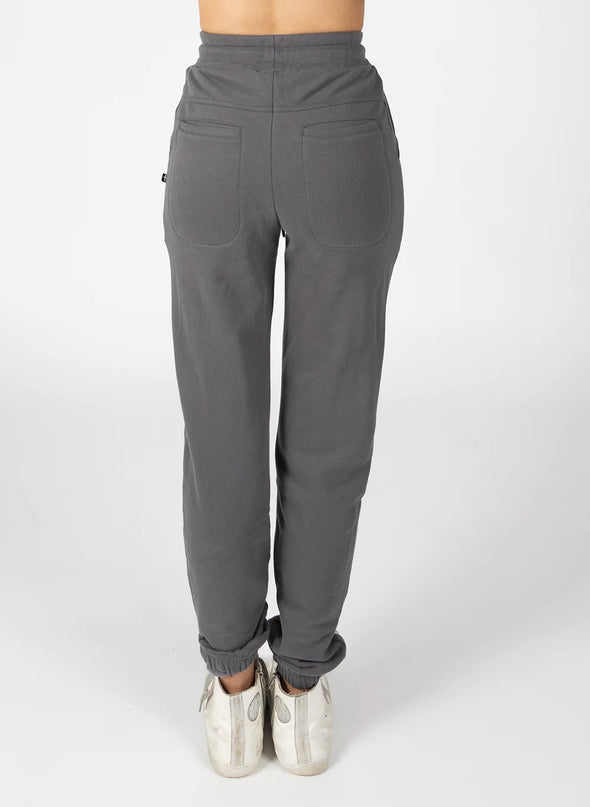 These will become your new season classic pant. High-waisted with a tailored fit through the hips. Keep the silver dome detailing fastened for a sleek, simple pant, or team with a pair of sneakers to make your look more casual. With each dome except the top two being able to open and close, these pants are a wardrobe staple thanks to their versatility.