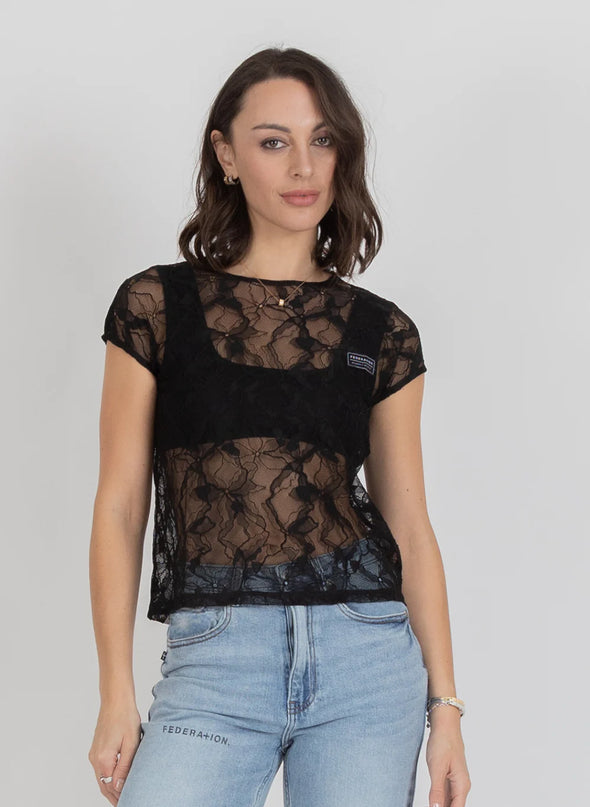 Delicate lace detailing for an elegant, elevated look

Soft, feminine silhouette

Perfect for both refined events and everyday polish

Timeless design that pairs effortlessly with trousers, denim, or skirts

Comfortable, easy-to-style fit