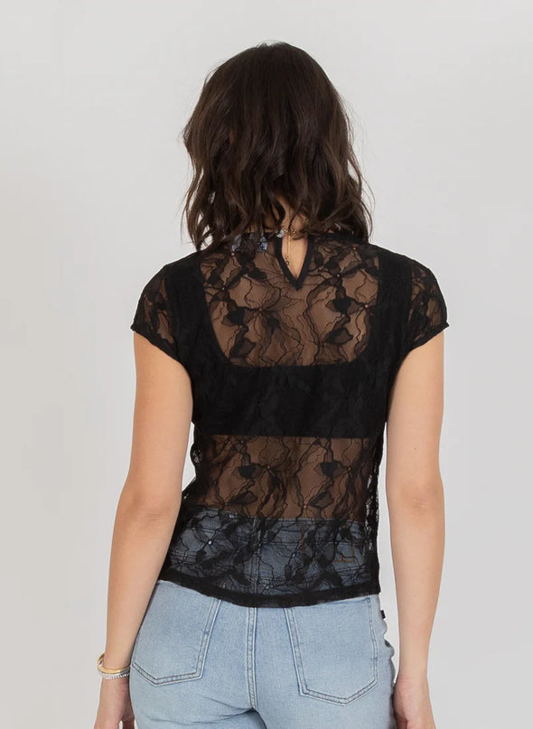 Delicate lace detailing for an elegant, elevated look

Soft, feminine silhouette

Perfect for both refined events and everyday polish

Timeless design that pairs effortlessly with trousers, denim, or skirts

Comfortable, easy-to-style fit