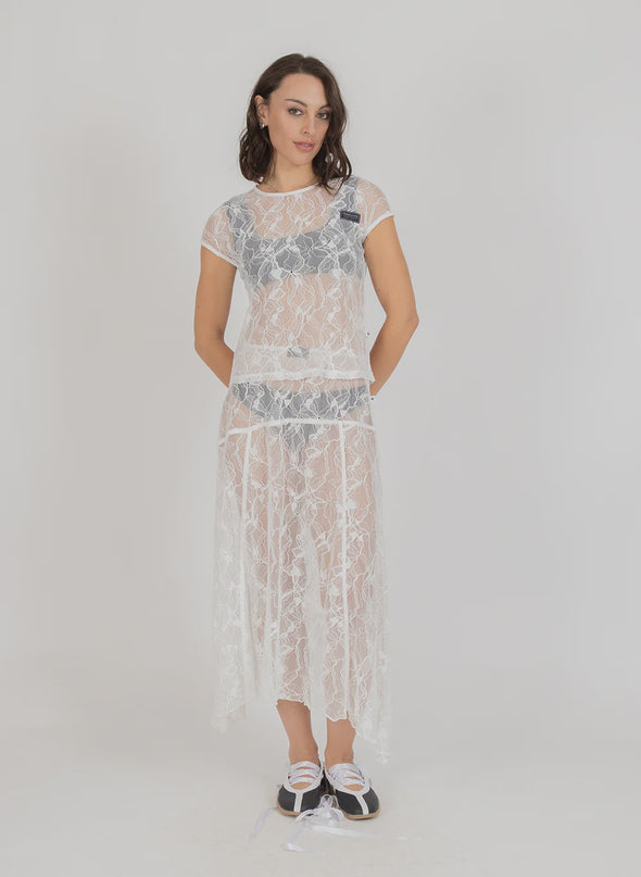 Delicate lace detailing for an elegant, elevated look

Soft, feminine silhouette

Perfect for both refined events and everyday polish

Timeless design that pairs effortlessly with trousers, denim, or skirts

Comfortable, easy-to-style fit