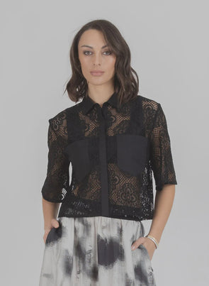Elevate your style with the Lace it Shirt, where delicate lace meets refined comfort. This lightweight, breathable piece contours gracefully to your silhouette, adding a subtle texture that enhances any outfit. Whether layered or worn alone, it effortlessly transitions from casual days to elegant evenings, embodying timeless sophistication with ease.