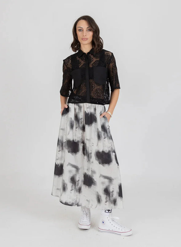 Elevate your style with the Lace it Shirt, where delicate lace meets refined comfort. This lightweight, breathable piece contours gracefully to your silhouette, adding a subtle texture that enhances any outfit. Whether layered or worn alone, it effortlessly transitions from casual days to elegant evenings, embodying timeless sophistication with ease.