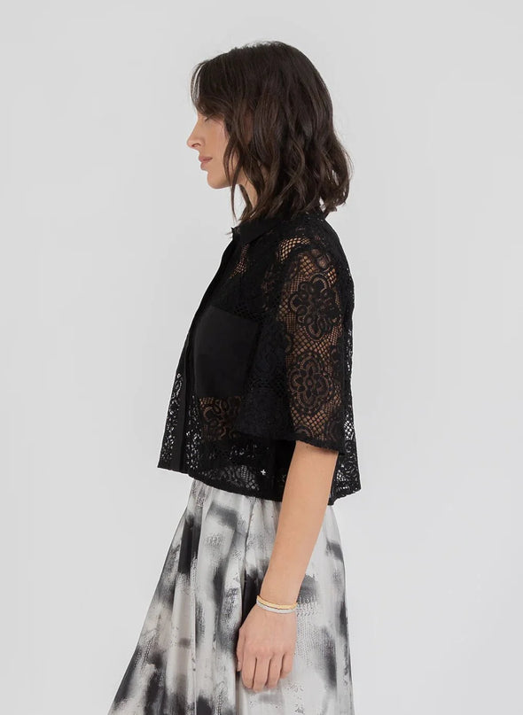 Elevate your style with the Lace it Shirt, where delicate lace meets refined comfort. This lightweight, breathable piece contours gracefully to your silhouette, adding a subtle texture that enhances any outfit. Whether layered or worn alone, it effortlessly transitions from casual days to elegant evenings, embodying timeless sophistication with ease.