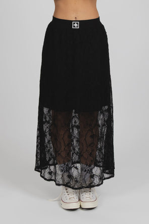 Enhance your wardrobe with the Lace It Skirt, featuring a delicate black lace overlay enriched by a stunning floral print. This elegant skirt combines grace and sophistication, making it ideal for formal events or polished daily wear. Its flowing silhouette moves gracefully with you, offering a timeless and flattering profile that complements your natural elegance.