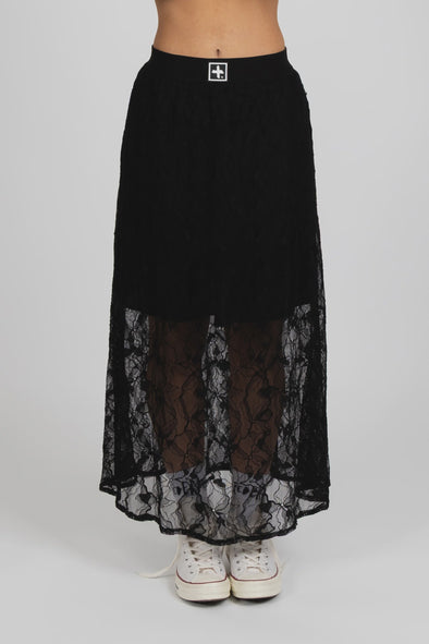 Enhance your wardrobe with the Lace It Skirt, featuring a delicate black lace overlay enriched by a stunning floral print. This elegant skirt combines grace and sophistication, making it ideal for formal events or polished daily wear. Its flowing silhouette moves gracefully with you, offering a timeless and flattering profile that complements your natural elegance.