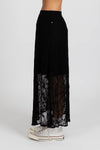 Enhance your wardrobe with the Lace It Skirt, featuring a delicate black lace overlay enriched by a stunning floral print. This elegant skirt combines grace and sophistication, making it ideal for formal events or polished daily wear. Its flowing silhouette moves gracefully with you, offering a timeless and flattering profile that complements your natural elegance.