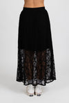 Enhance your wardrobe with the Lace It Skirt, featuring a delicate black lace overlay enriched by a stunning floral print. This elegant skirt combines grace and sophistication, making it ideal for formal events or polished daily wear. Its flowing silhouette moves gracefully with you, offering a timeless and flattering profile that complements your natural elegance.