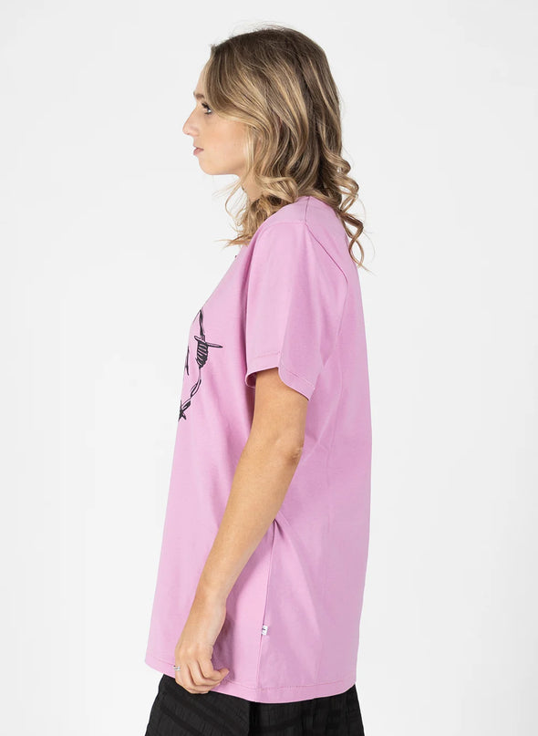 The Rush Tee is our favourite relaxed-fit tee shirt. Taken the best elements of an oversized tee and fine-tuning the shoulders and neckline to stay feminine. The sleeves and the hem have a nice grinning stitch detail too.  Complete with the&nbsp;new Caution print.  COMPOSITION 100% Cotton