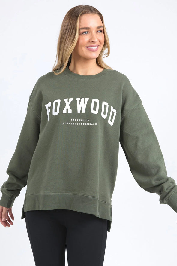 Introducing the must-have for this season: the Foxwood Interval Crew! With its timeless crew neckline and front chest print, this sweatshirt makes a subtle statement. But don't be fooled, the oversized back and shoulder print add a bold touch. Made with Foxwood LeisureFit fleece, it's the perfect blend of classic and standout style.