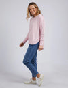 Add a pop of colour to your casual wardrobe with the Foxwood Simplified Crew in a Pretty Pink. This vibrant crew is the ultimate layering piece, designed to bring both comfort and style to your everyday outfits. Featuring a relaxed round neckline, a flattering hi-lo hemline with side splits, and trendy raw edge detailing, this crew offers an effortlessly cool vibe. The embroidered Foxwood logo on the chest adds a touch of signature style, making this a go-to piece for any casual look.

Made from 100% cotton