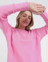 Front chest embroidery
Raw edge detail
Curved hem
100% Cotton