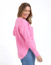 Front chest embroidery
Raw edge detail
Curved hem
100% Cotton
