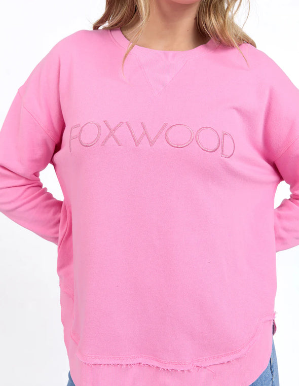 Front chest embroidery
Raw edge detail
Curved hem
100% Cotton