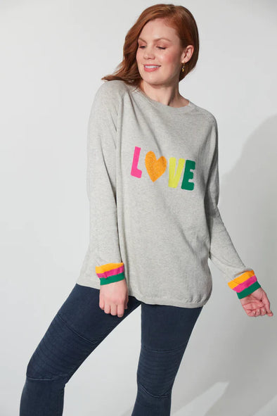 Highlighted by a woven 'LOVE' motif at the forefront, the Boden Love Jumper is a heartwarming addition to your wardrobe. This knit jumper exudes casual charm with a round neck, raglan sleeves, and playful contrasting cuffs. Crafted from comfortable cotton construction, it's perfect for everyday wear. Pair it with loose linen pants and slides for a cool, casual vibe!