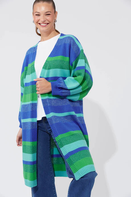 Introducing the Yuma Cardigan, a statement piece with vibrant high-contrast stripes, glimmering Lurex threading, and a relaxed fit silhouette. The open-front design effortlessly drapes over any outfit, whether light or layered. Crafted from a luxurious wool blend, this cardigan will elevate your style and bring energy to your next adventure.