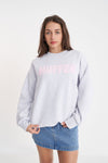 Stay cozy and stylish in the Huffer Crewneck! With a playful twist on the classic crewneck, this sweater features a bold pale pink "Huffer" graphic across the chest in bubble letters. Perfect for any occasion.&nbsp;