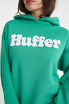 Stay cool (both literally and fashionably) with our vibrant green huffer hoodie! Show off your playful side with the huffer logo boldly printed in white bubble letters across the chest. Perfect for any casual occasion, this hoodie is a must-have addition to your wardrobe.