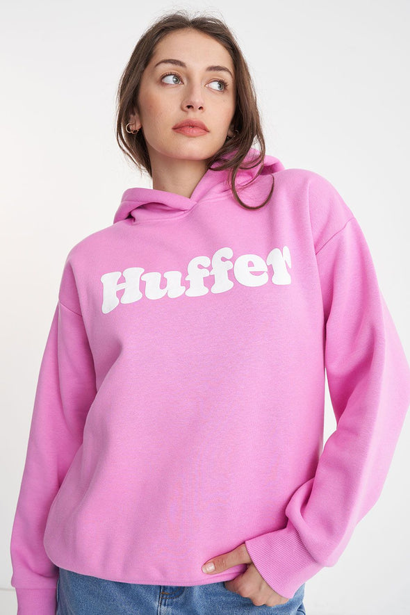 Get ready to rock a cool and playful vibe with our Huffer Hoodie! Featuring bold huffer branding in fun bubble writing, this hoodie is the perfect addition to any quirky outfit. Stay cool and stay stylish with this must-have piece.