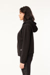 Black beauty by Huffer this hoodie is all the luxe loungewear we desire. With a thick fabrication it holds its own and keeps its structure. Featuring a Huffer branding and invisible zips. A layer to take you to the gym, for a walk or simply a movie on the couch.