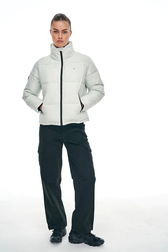 Delivers highly functional warmth with 100% REPREVE recycled polyester fill. REPREVE is developed from bottles collected from the environment and has recycled over 33 billion bottles to date. Light and cropped leading with aesthetic. 100% polyester outer shell with Durable Water Resistant (DWR) coating allowing water to bead off the outer shell. Features Japanese technology YKK zips and Huffer superior toasty pocket lining.