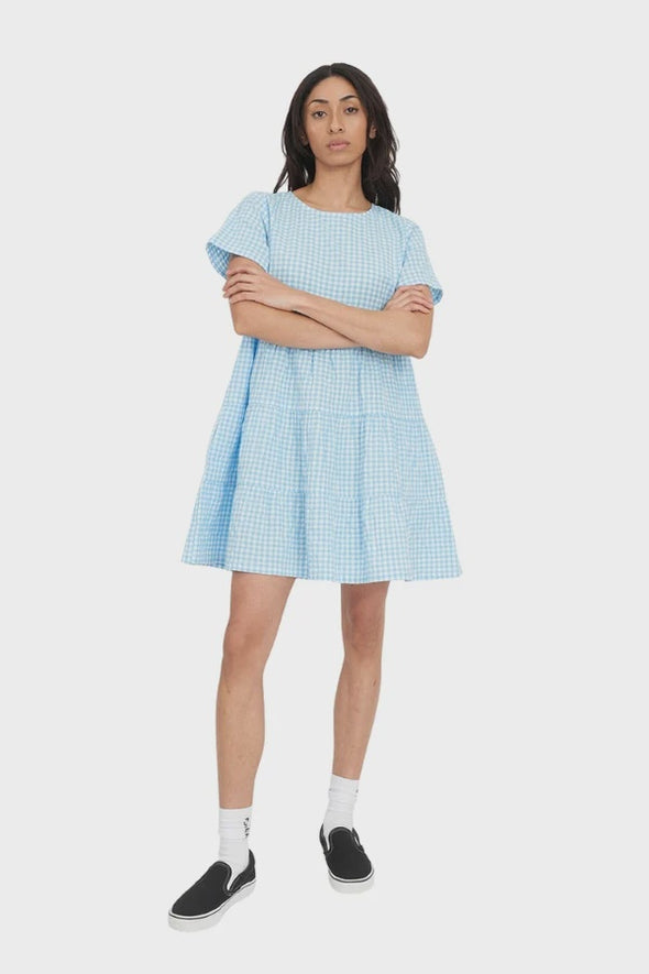 Bring Sunshine to your day with the Catalina Milly Dress. This playful peice blends soft blue tones with chalk white accents for a cheerful, fesh look. designed with a flattering, easy to move cut it's perfect for sunny days, brunch dates, and spontaneous adventures.

95% Cotton, 5% Elastane