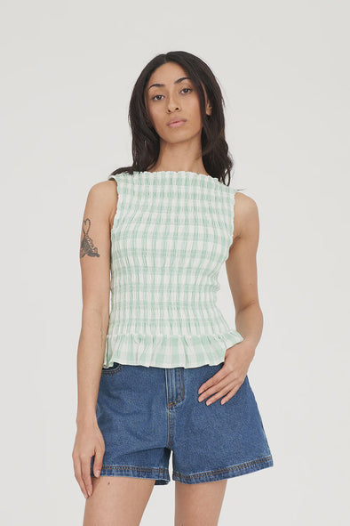Sweet, fresh, and effortlessly flattering — the Gigi Shirred Top is your go-to for easy summer styling. Featuring a soft gingham check in Matcha green and Chalk white, this top brings a playful twist to classic patterning.