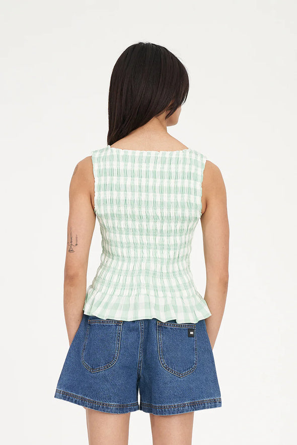 Sweet, fresh, and effortlessly flattering — the Gigi Shirred Top is your go-to for easy summer styling. Featuring a soft gingham check in Matcha green and Chalk white, this top brings a playful twist to classic patterning.