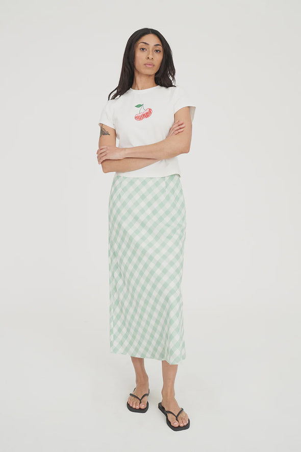 Say hello to effortless style with the Lila Midi Skirt — a refreshing addition to your warm-weather wardrobe. Showcasing the same Matcha green and white diagonal gingham print as the Celine Dress, it’s perfect for coordinating or standing out on its own.
